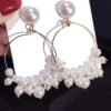 Shop Online Now. Round Earrings with White Pearls. Delivery Across Pakistan.